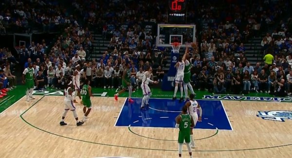 pity! Thick eyebrows caught the ball under the basket and beat Chet for a one-arm dunk, but the 24-second violation came first